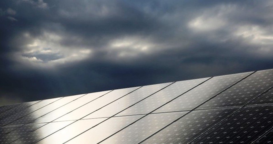 solar panel with cloudy sky